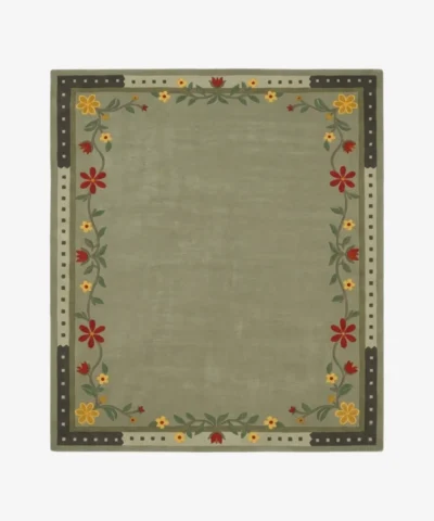 An overhead top-down view of the rectangular Florivert area rug, displaying its solid sage green center surrounded by a vibrant floral vine and a dark dashed outer edge.