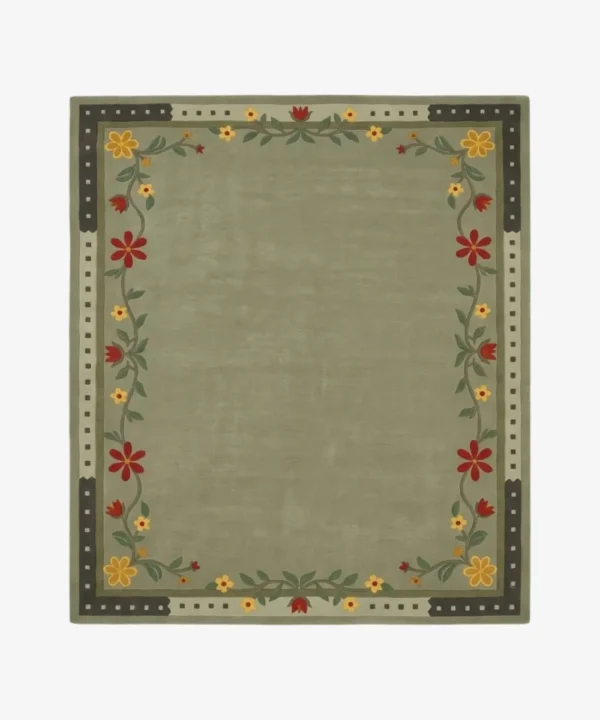 An overhead top-down view of the rectangular Florivert area rug, displaying its solid sage green center surrounded by a vibrant floral vine and a dark dashed outer edge.