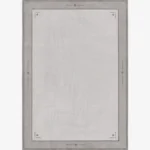 Hazeon grey and cream bordered area rug featuring geometric diamond details, displayed flat.