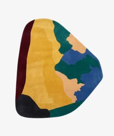 Laendra abstract shaped tufted area rug displayed flat on a clean background.