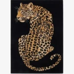 Leobra leopard patterned tufted area rug displayed flat on a clean background.