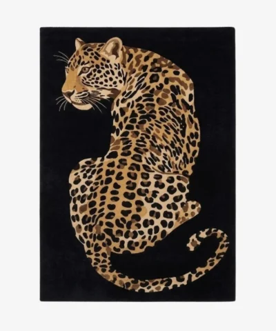 Leobra leopard patterned tufted area rug displayed flat on a clean background.