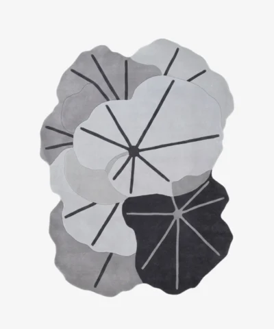 Full top-down product isolated shot of the custom-shaped Lotus Canopy area rug, featuring overlapping organic lotus leaf contours with prominent dark grey veining across a monochromatic palette of off-white, light grey, and charcoal.