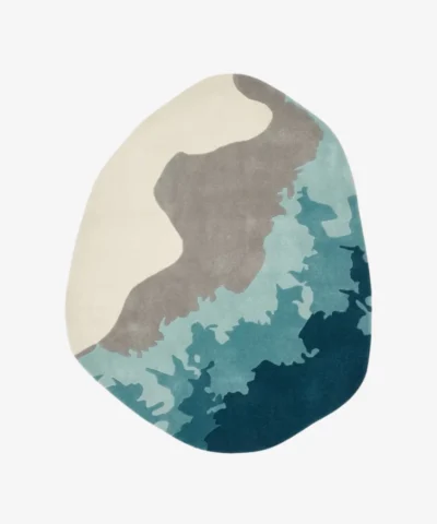 Marina Wave organic irregular shaped abstract ocean-inspired area rug featuring teal, blue, grey, and cream color blocking displayed flat.