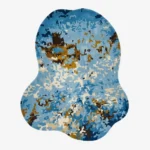 Seafall abstract blue and gold organic shaped tufted area rug displayed flat against a clean background.