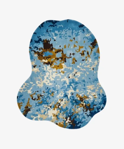 Seafall abstract blue and gold organic shaped tufted area rug displayed flat against a clean background.