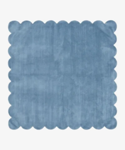 Skye Elara blue square area rug featuring a playful scalloped edge and plush tufted texture, displayed flat.