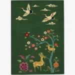 Verdanis green rectangular tufted area rug featuring traditional crane birds, floral motifs, and deer designs displayed flat against a clean background.