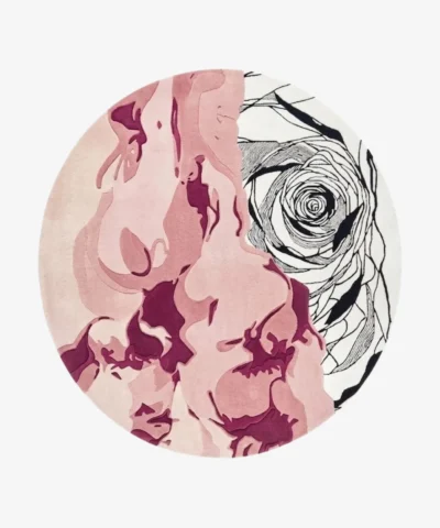 Florio Eclat round abstract tufted area rug combining split designs of pink fluid color blocking and a black-and-white linear rose, displayed flat.