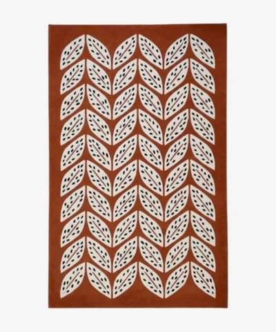 Folivora Leaf terracotta rectangular area rug featuring a repeating white and black botanical leaf pattern, displayed flat.