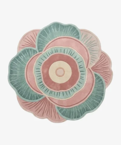 Palestra floral-shaped tufted area rug featuring concentric circles and petal patterns in pink, teal, and cream, displayed flat.