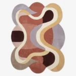 Ribona organic irregular shaped abstract tufted area rug featuring terracotta, mauve, yellow, and cream color blocking, displayed flat.