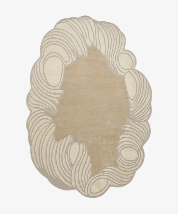 Flat-lay top view of the Tidewave designer wavy border rug showcasing its abstract shape and neutral earth tones.