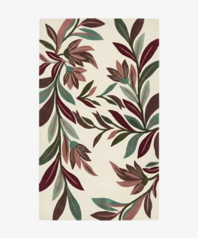 A clean, flat-lay studio product photograph of the complete rectangular Flora rug on a plain white background, clearly presenting its full mirrored pattern of multi-colored leaves and flowers in maroon, teal, green, mauve, and ivory