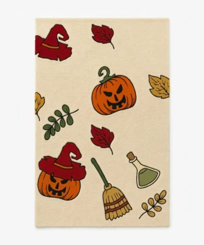 Studio flat-lay product photograph of the rectangular Wicked Pumpkin rug on a clean background, showcasing the cream wool field patterned with spooky jack-o'-lanterns, witch hats, a broomstick, potion bottles, and autumn leaves.